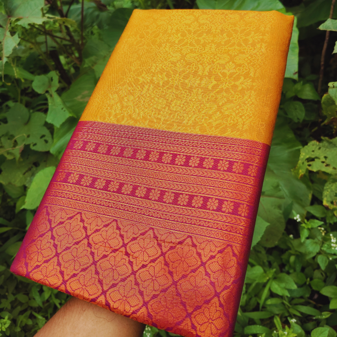 Vaidehi Vastra Saffron and Pink Soft Silk Saree