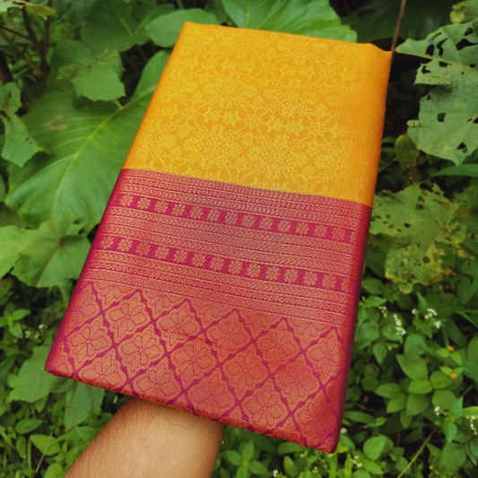Vaidehi Vastra Saffron and Pink Soft Silk Saree