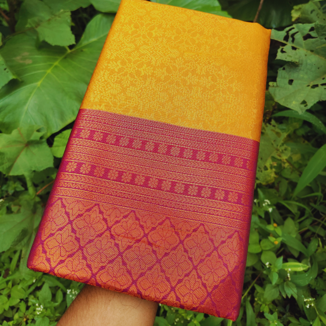 Vaidehi Vastra Saffron and Pink Soft Silk Saree