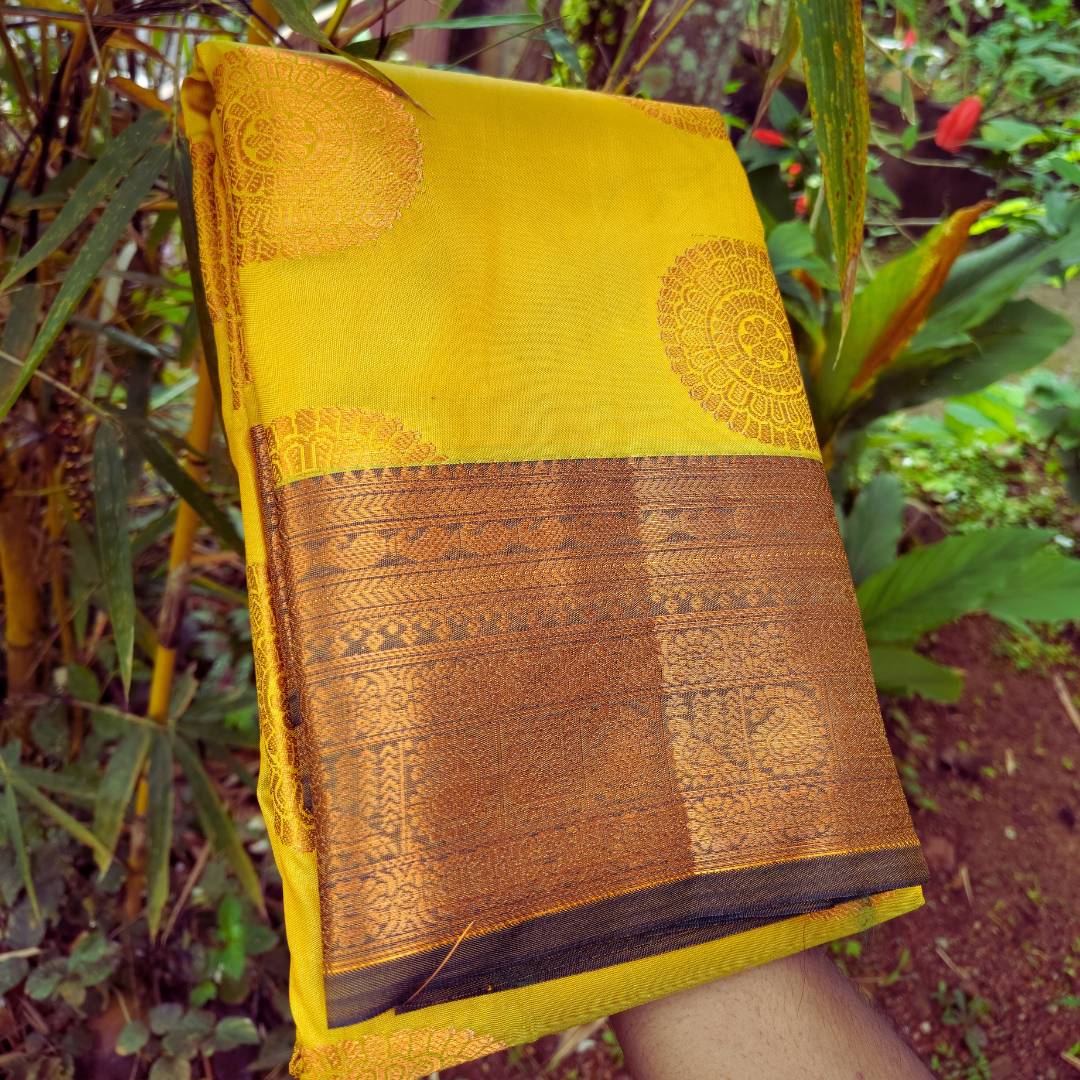 Vaidehi Vastra Saffron and Black Soft Silk